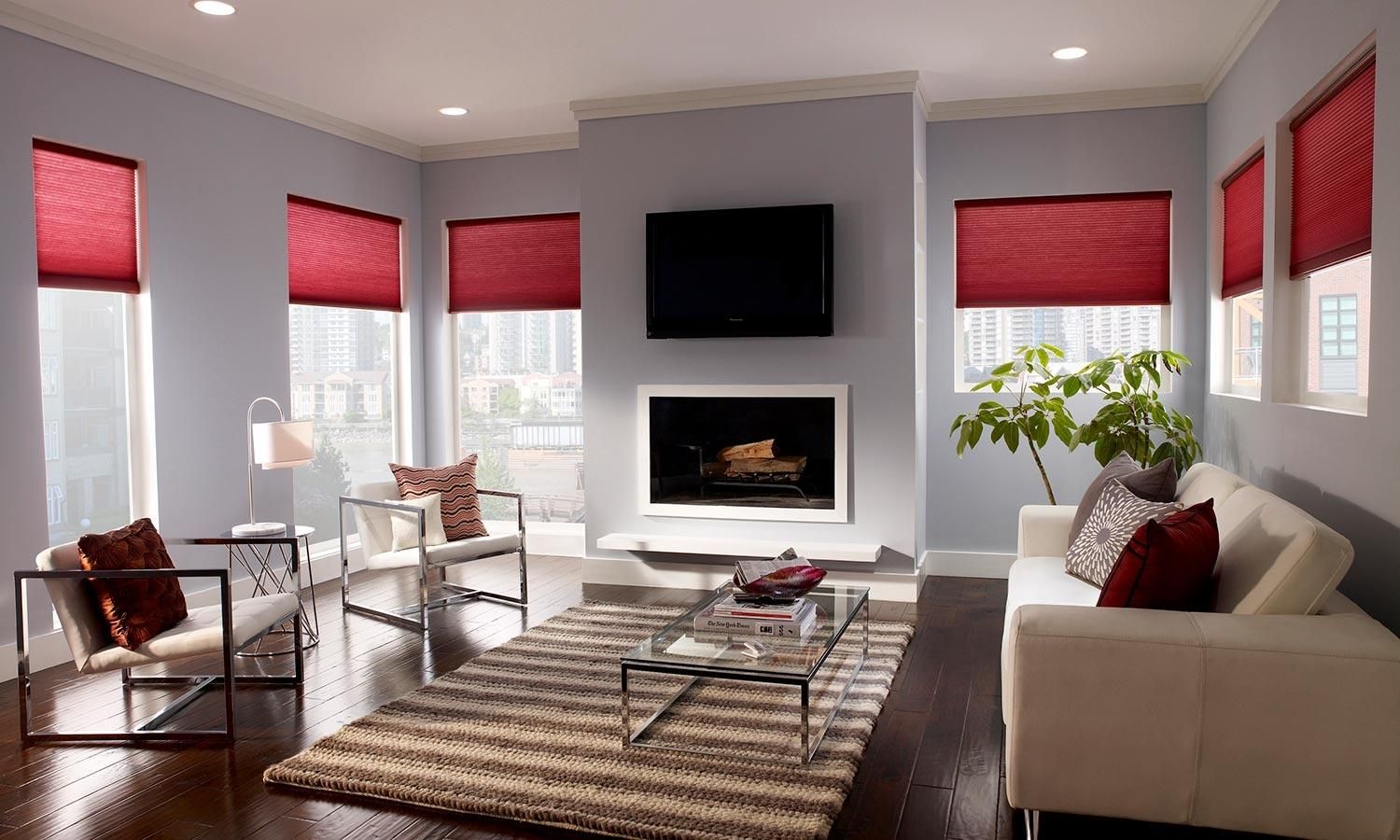 red honeycomb shades in a living room